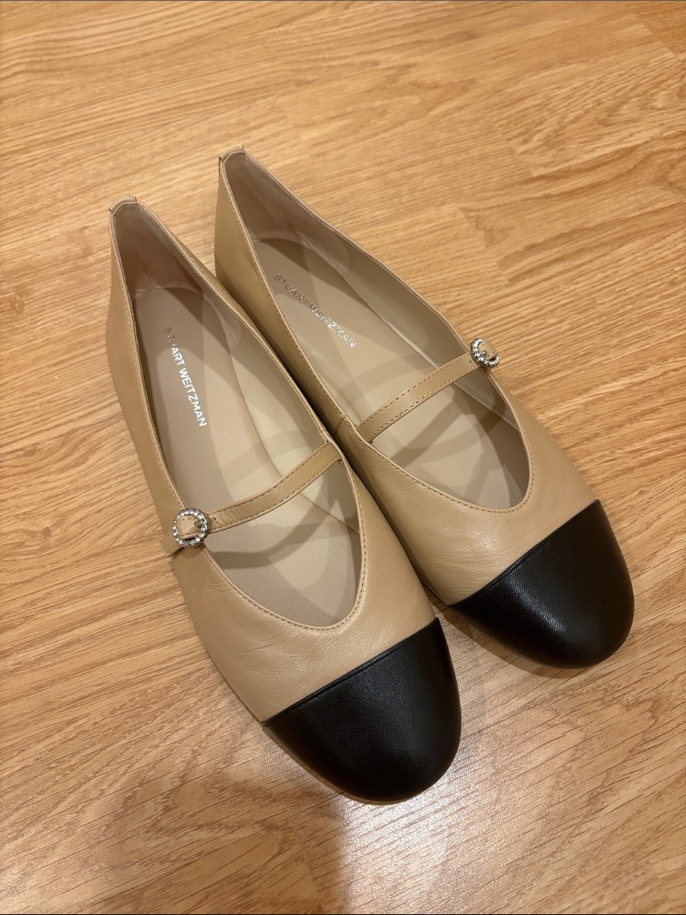 Stuart Weitzman Beige and Black Cap-Toe Mary Jane Flats